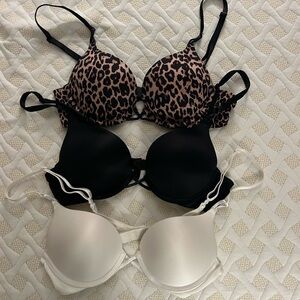 Victoria's Secret Bombshell Leopard, Black, and White Bra Trio